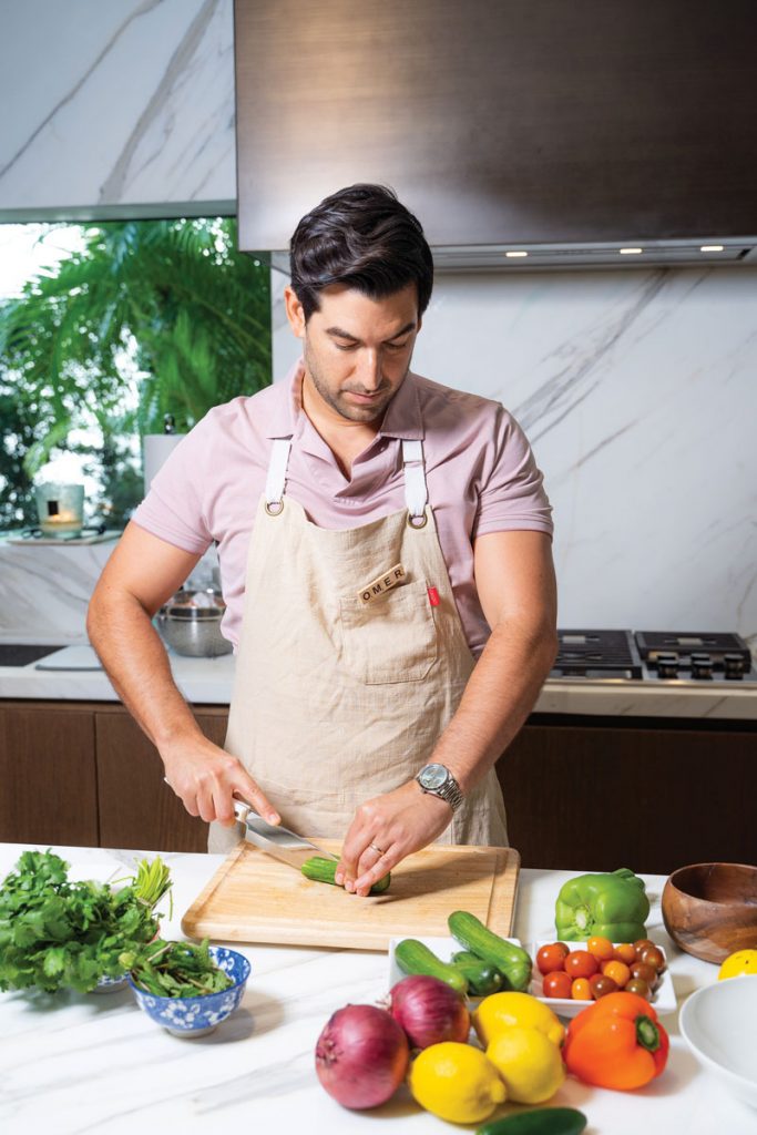 Omer and Jennifer worked together to organize the festivities, with Omer leading the kitchen.