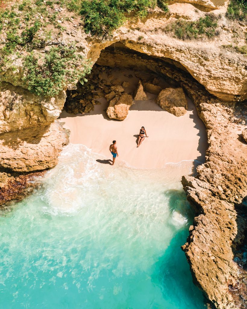 The couple relaxes on the beach in Anguilla. Photo courtesy of Jeremy Austin and Angie Villa
