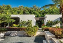 Modern Classicism Rules in Miami Home’s Scenery The residence’s two outdoor structures have been used for everything from guest quarters to art storage space and even a classroom during the COVID-19 pandemic. Dominican coral was used for the hardscape to give the property a warm quality.