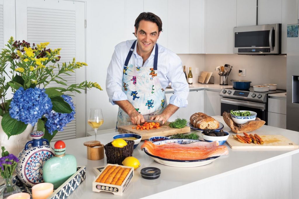 Foulquier preps ingredients in one of his prized Grateful Dead aprons, festooned with the band’s signature dancing bears on a tie-dyed background