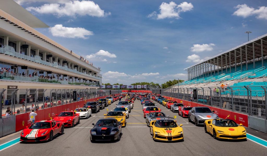 A huge line-up of modern-day Ferrari road cars ready for a demonstration lap. Photo courtesy of Ferrari