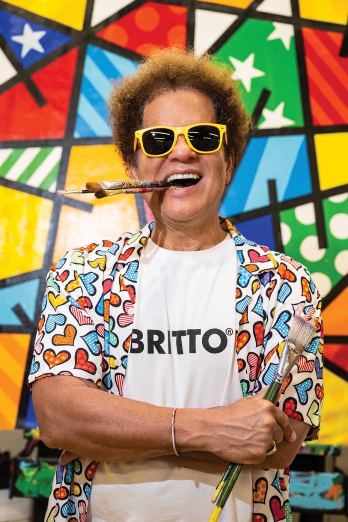 Brazilian artist Romero Britto’s artwork explodes with positive energy and joyful hues. Photo by Steven Martine