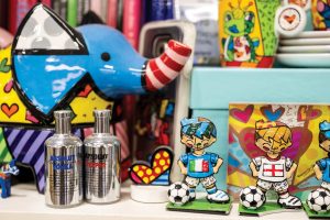 Collectibles adorned with Britto's art. Photo by Steven Martine