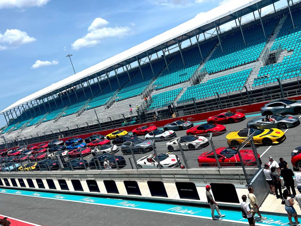 More than 100 Ferrari owner cars lined up on the Hardrock Stadium track. Photo by Howard Walker