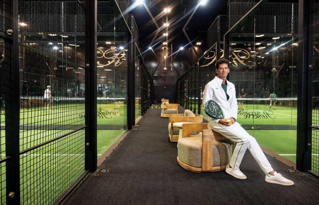 Wayne Boich presides over the padel courts at Reserve Padel, his new two-story premier club located at SoLe Mia in North Miami. Photo by Steven Martine