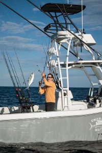 Miller reels in a catch. Photo by Steven Martine