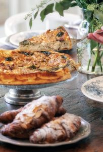 Maman’s famous Quiche Sophie with spinach, feta, and artichoke. Photo by Jerry Rabinowitz