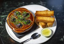 Enjoy a Wok Star Supper Club Dinner at Wayan Miami Escargot rendang at Wayan Miami. Photo by Noah Fecks