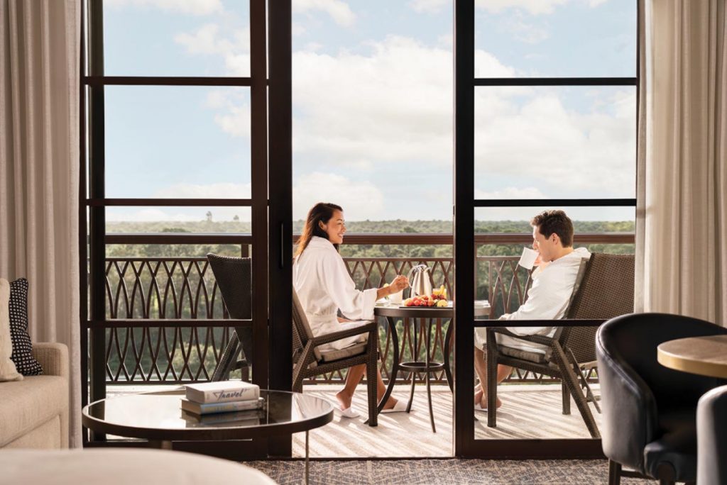 Rooms with balcony views of the resort’s water park and Disney fireworks. Courtesy of Four Seasons Orlando
