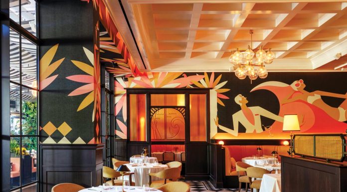 Slim’s Debuts in Bal Harbour Shops The indoor dining room features Art Deco murals by Christoph Niemann. Photo courtesy of Starr Restaurants