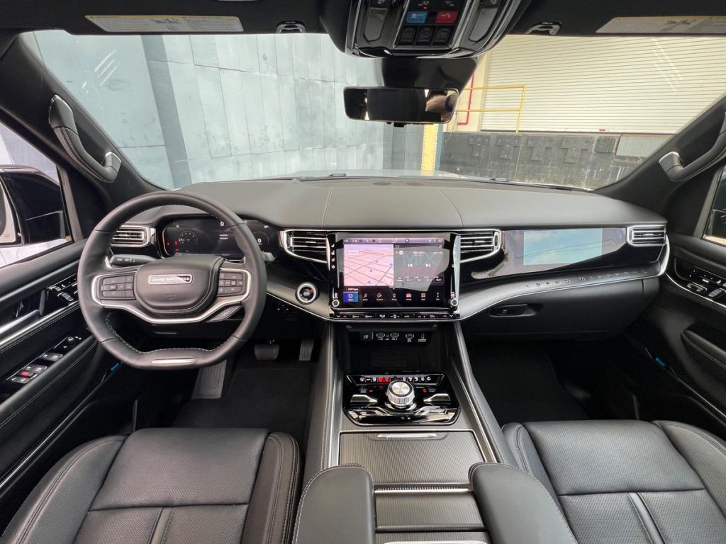 The sprawling dashboard inside the Jeep Grand Wagoneer L. Photo by Howard Walker